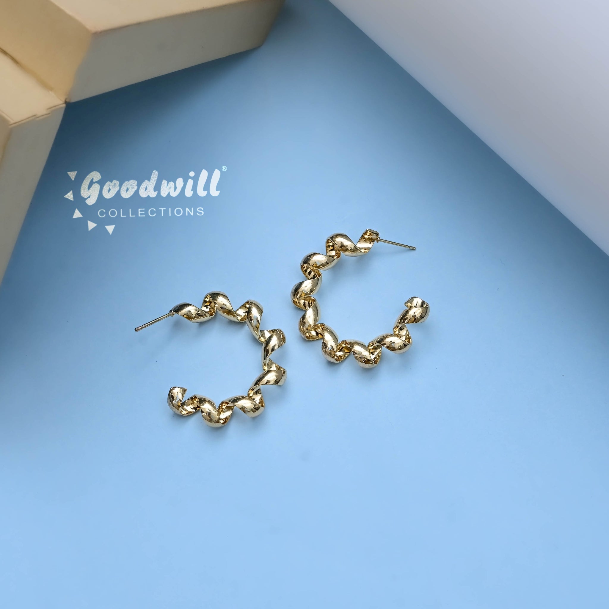 GOLDEN SPIRAL HOOP EARRINGS