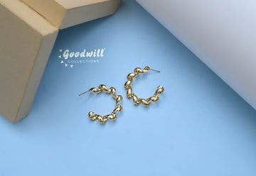 GOLDEN SPIRAL HOOP EARRINGS
