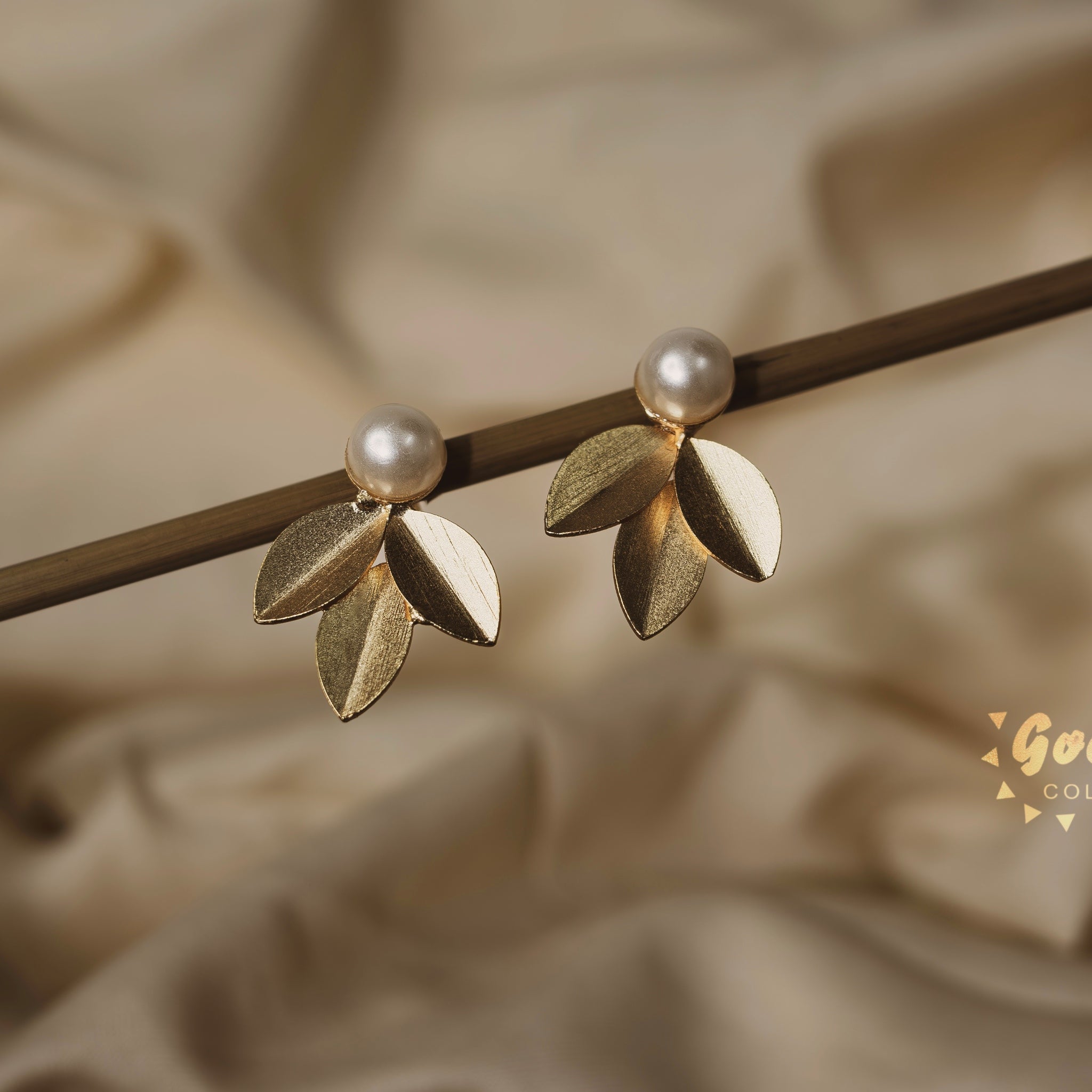 PEARL LEAF DROP STATEMENT EARRINGS